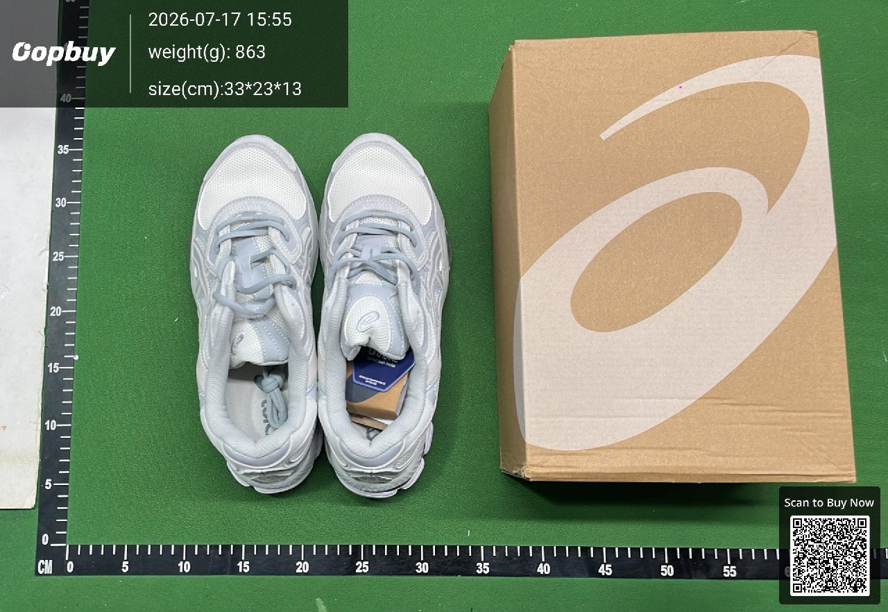 Shoes and box on a green warehouse inspection mat
